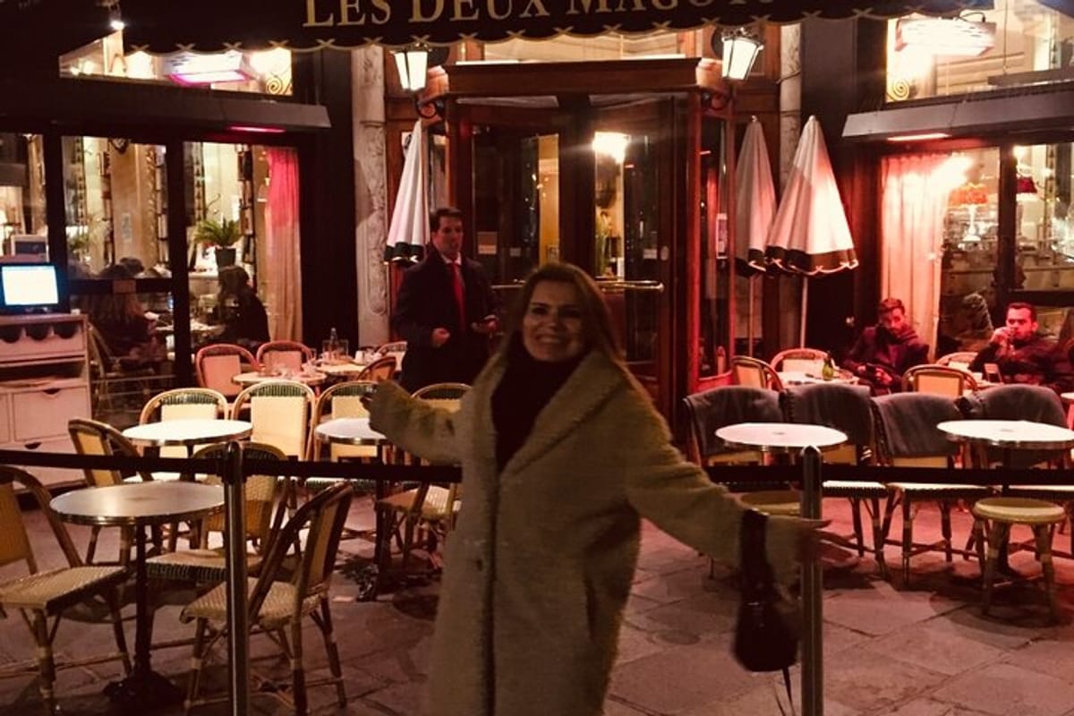 Me, in front of the wo Magots, the famous people parisien café 