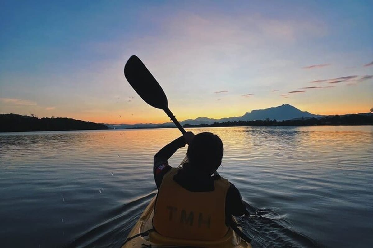 Paddle towards the Mount Kinabalu while feeling the warmth of sunrise touches your skin